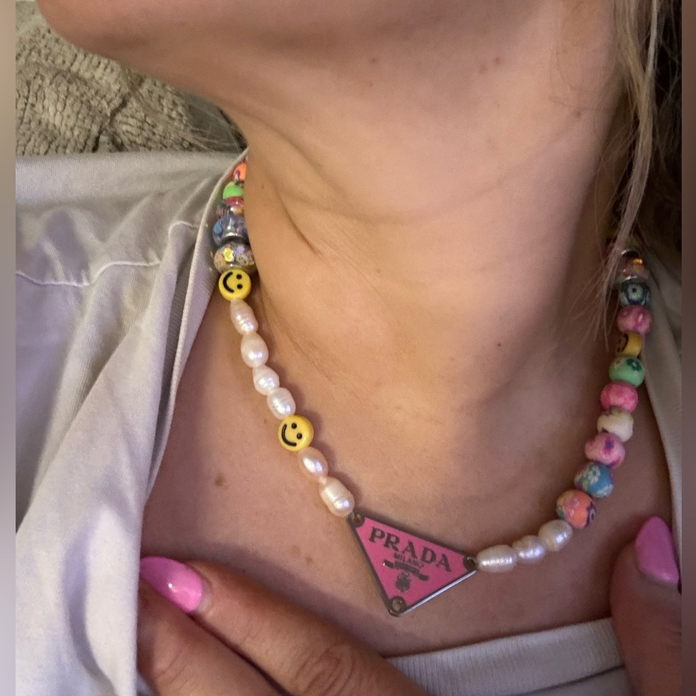 Repurposed Lux Prada Charm 7- 10mm fresh Water Pearls And Clay Beaded Necklace.